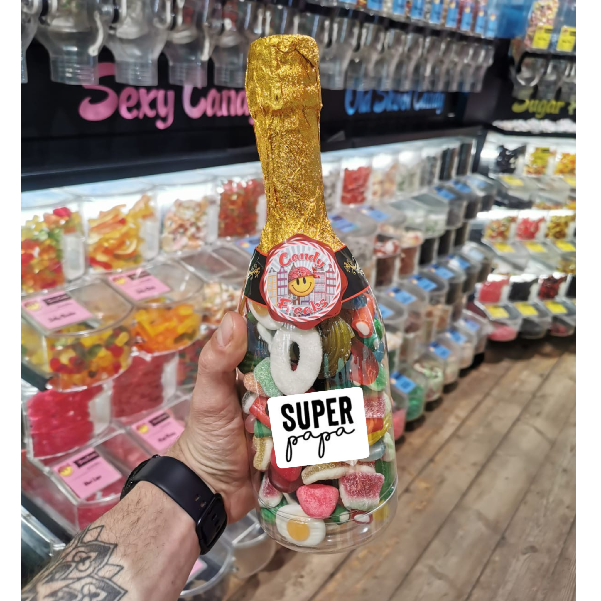 Champagnefles gevuld met snoepjes voor Vaderdag