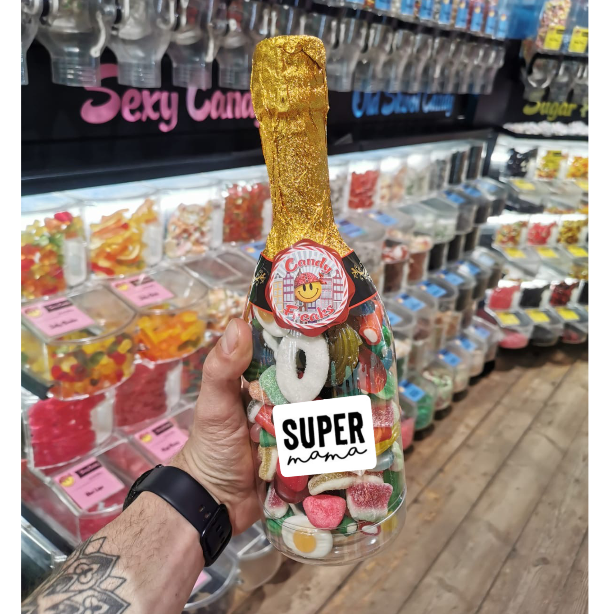 Champagnefles gevuld met snoepjes voor Moederdag