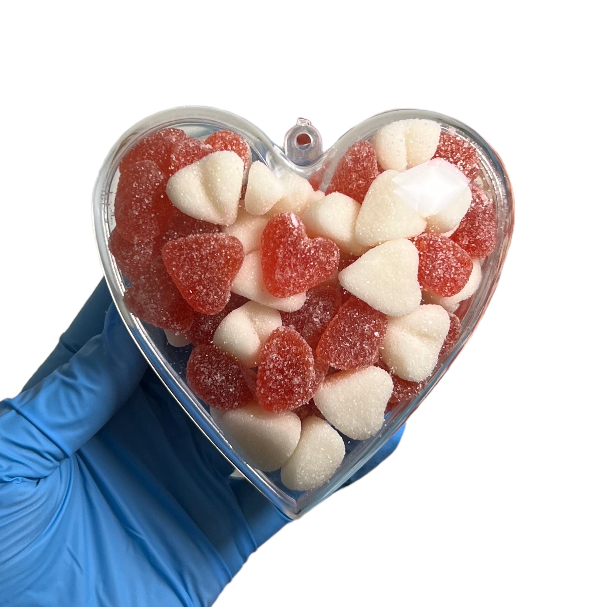 Plastic hart gevuld met fruit snoepjes